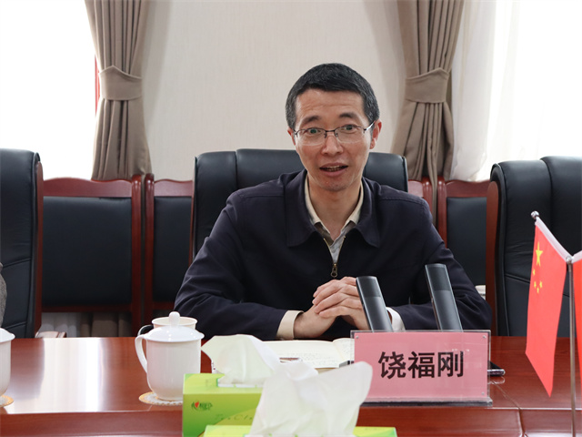 鄧華會見宜賓市供銷社黨委書記、理事會主任饒福剛一行